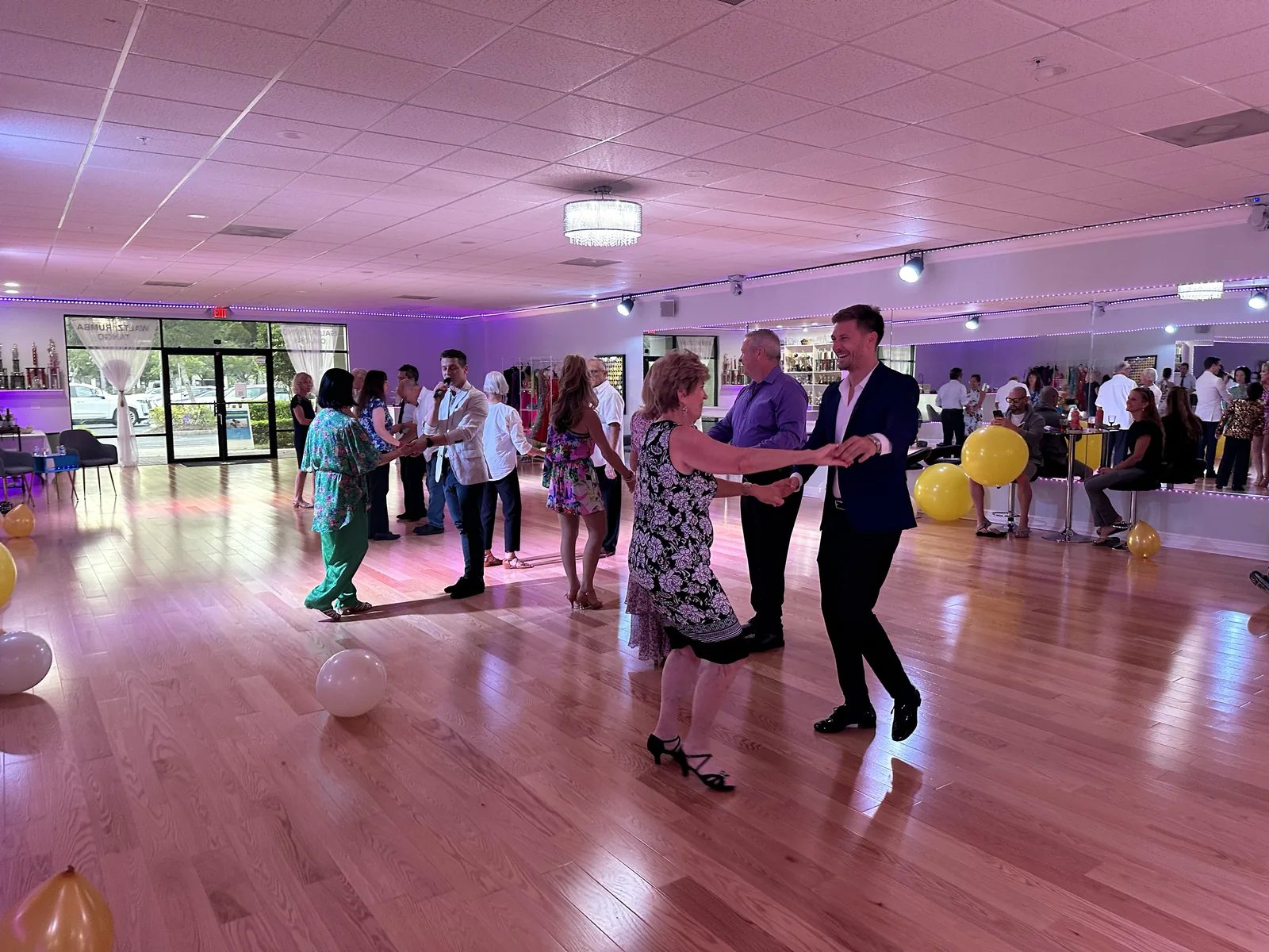 Couples practicing ballroom dancing at Naples Dance Club
